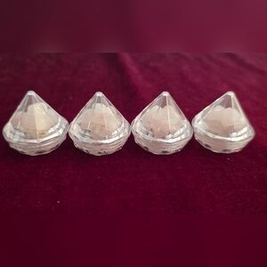 Clear Diamond Shaped Plastic Containers Filled With Rose Quarz Chips